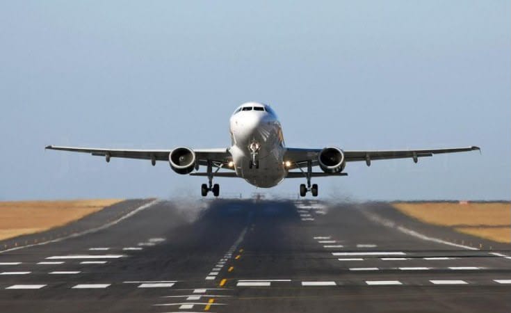 Executive jet departing a Nigerian airport apron